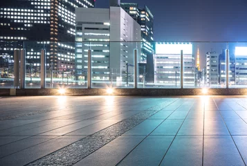 Raamstickers empty floor with modern office buildings in downtown of tokyo at © zhu difeng