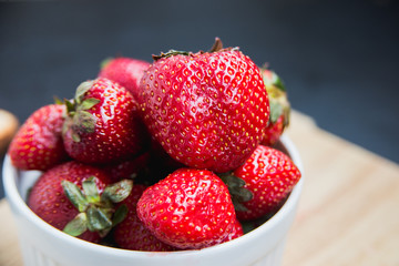 strawberries in white dish