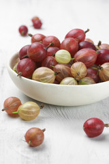 Gooseberries in white bowl