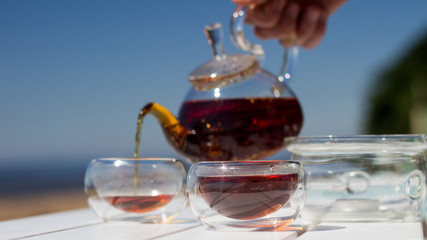 Tea ceremony on a summer beach
