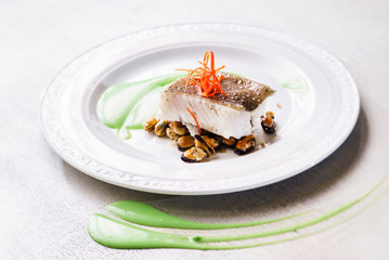 roasted fish steak with mussels
