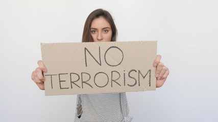 Girl Appearing against Terrorism with Tablet