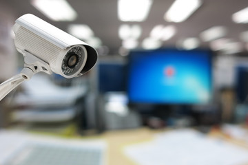CCTV Camera security operating in office building.