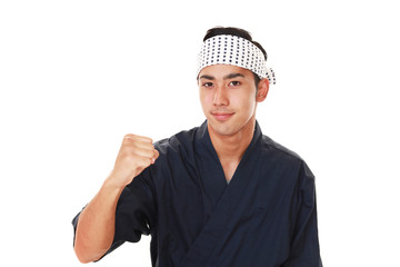 ガッツポーズの寿司職人