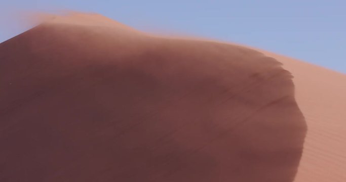 4K view of strong wind blowing sand off the edge of the dune inside the Namib-Naukluft National Park