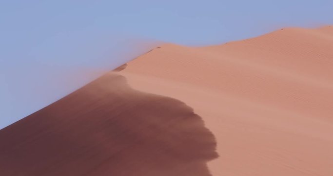 4K view of strong wind blowing sand off the edge of the dune inside the Namib-Naukluft National Park