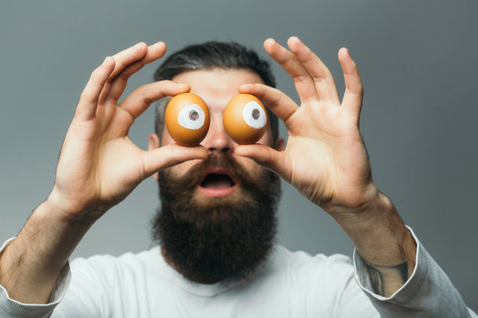 emotional bearded man with egg eyes