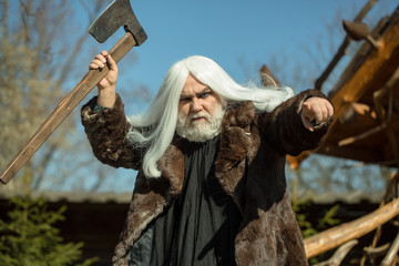 Brutal old druid with axe