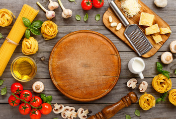 Spaghetti and fettuccine with ingredients for cooking pasta