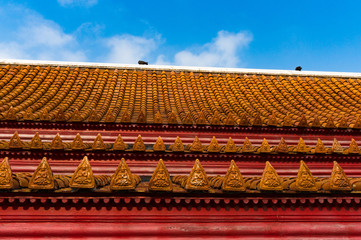 Fototapeta na wymiar Architecture details. Traditional Asian roof tiles with copy space