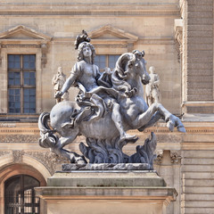 Fototapeta na wymiar Sculpture of an ancient knight at Louvre Museum, Paris