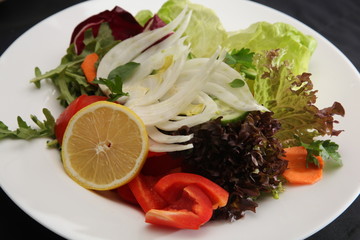 vegetables fennel and lemon on the plate