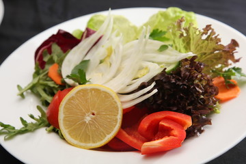 vegetables fennel and lemon on the plate