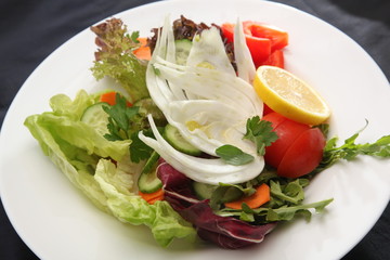 vegetables fennel and lemon on the plate