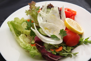 vegetables fennel and lemon on the plate