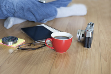 man with laptop computer, coffee cup and eyeglasses