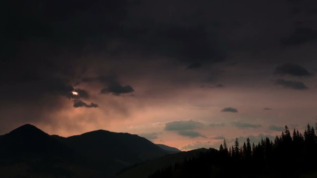4K.Evening red sun in mountains. Time lapse without birds.