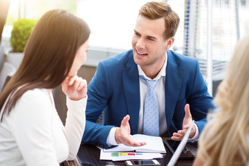 Positive colleagues talking