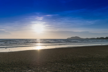 Summer time on sky and sand of beach