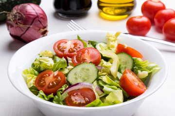 vegetable salad in white bowl