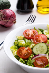 vegetable salad in white bowl
