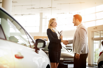 Customer buying a car at dealership