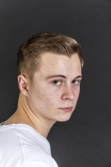 portrait of serious looking teenage boy
