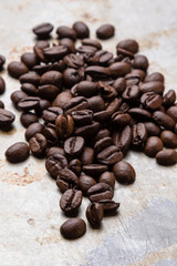 coffee beans on a steel plate