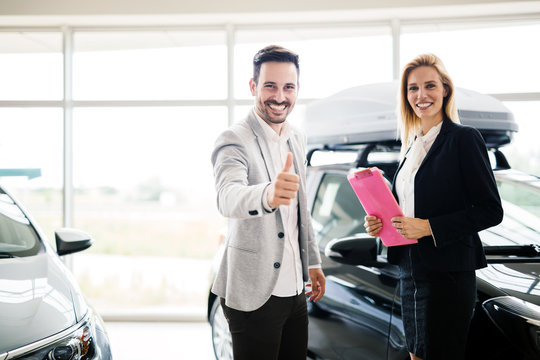 Customer buying a car at dealership