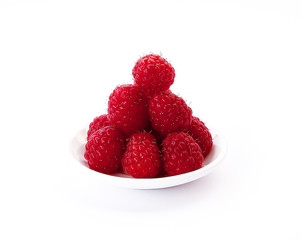 beautiful raspberries on white