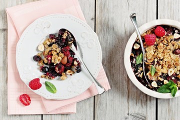Berry crumble. Clean-eating gluten free dessert . Superfoods concept.Toned image, selective focus. 