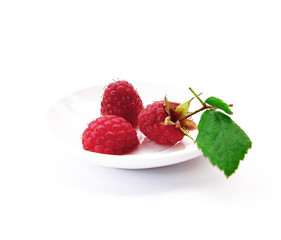 beautiful raspberries on white