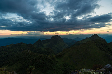 Sunset in mountains over hills