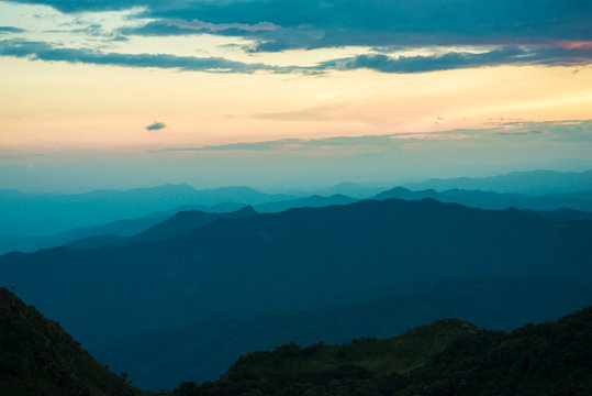 Sunset in mountains over hills