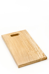 Kitchen wooden cutting board isolated over white