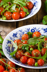 Salad of arugula and cherry tomatoes