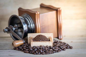old vintage coffee grinder with coffee beans