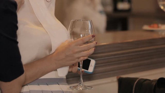 Girls Drink White Wine Beautiful young woman drinking red wine. Close up video footage of beauty lady with glass of wine.