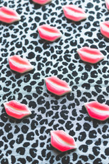 candy mouth lips on dark trendy background, minimal theme and design