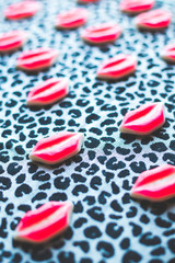 candy mouth lips on dark trendy background, minimal theme and design