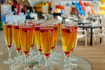 A set of goblets with berry cocktail in a water park