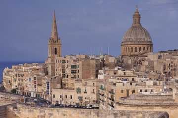 Close view of the the bell-tower and dome of the Basilica of Our Lady of Mount Carmel in Valletta, Malta
