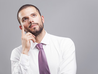 Portrait of a thoughtful young business man
