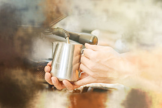 hand of barista mixing milk and chocolate on espresso machine for making