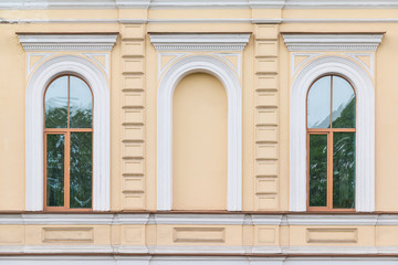 Two windows in a row on facade of Secondary school №232, St. Petersburg, Russia.