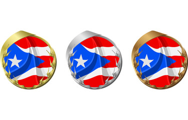 A gold, silver and bronze medal with the flag of Puerto Rico inside.