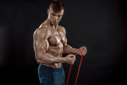 Young athletic man exercising