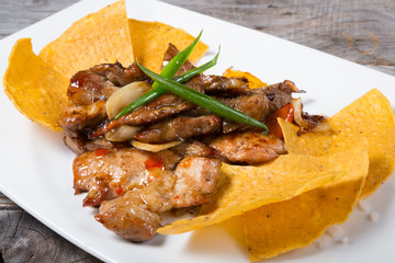 Nachos with fried meat