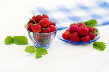 bright, juicy and ripe strawberry on a light background