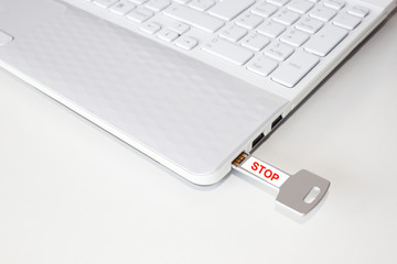 Pendrive in a laptop with the stop word